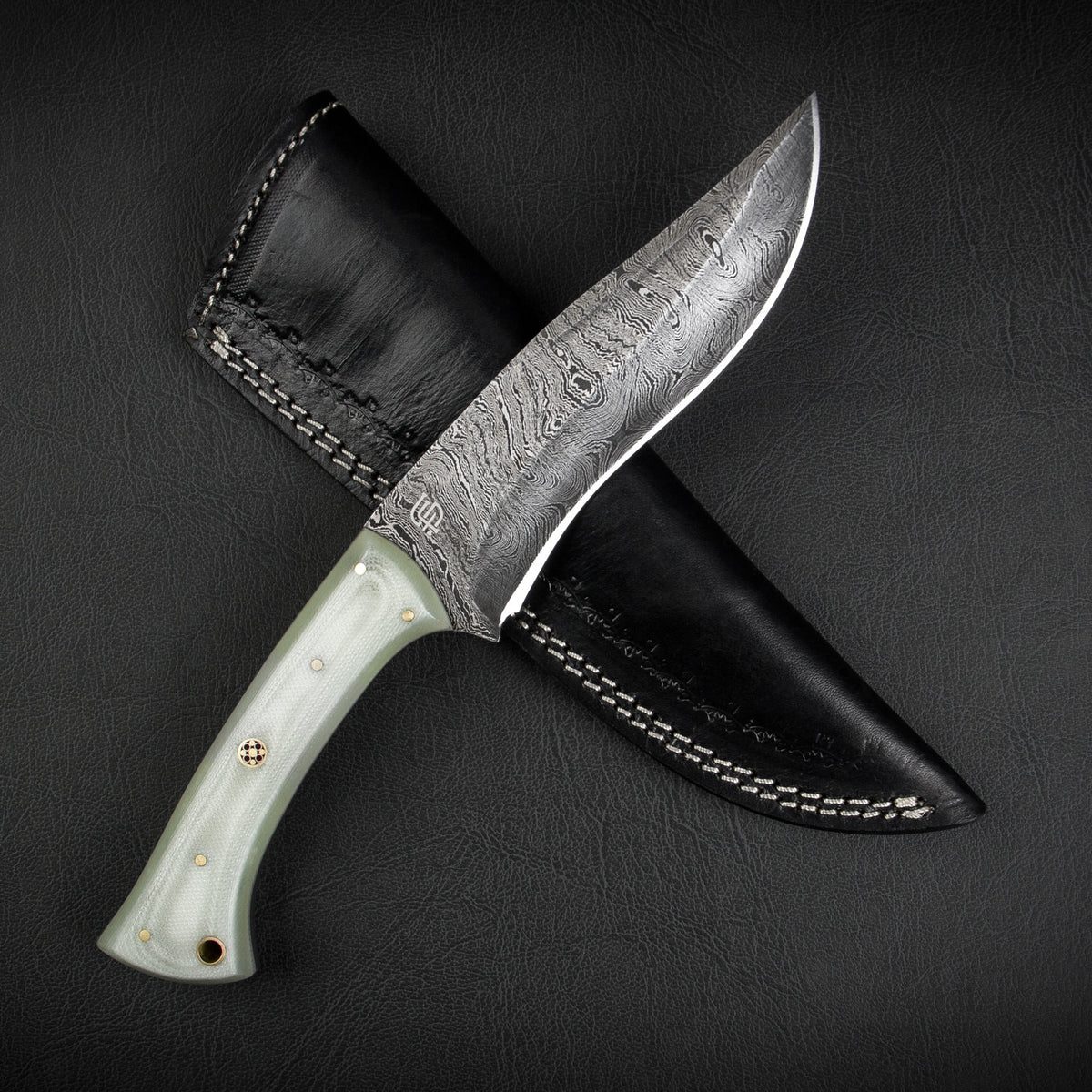 http://forsetisteel.com/cdn/shop/products/MK-27-Immortals-Damascus-Steel-Knife-1__49378_1200x1200.jpg?v=1608239826